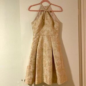 Light pink & cream floral a-line tea-dress w/ pockets & high neck bow detail.